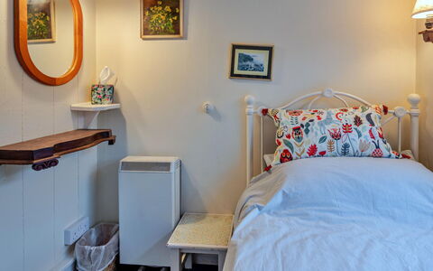 Millook Water: Furniture, Interior Design, Wall, Bedroom, Bed, Bed Sheet, Bedding, Room, Textile, Lighting