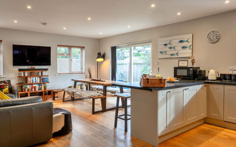 Gwelmor: Furniture, Interior Design, Flooring, Floor, Wood, Ceiling, Room, Kitchen, Wood Flooring, Lighting