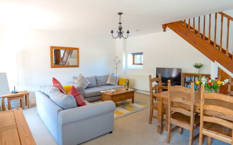 Olive Tree at Widemouth Bay: Furniture, Wood, Flooring, Interior Design, Floor, Ceiling, Couch, Table, Room, Living Room