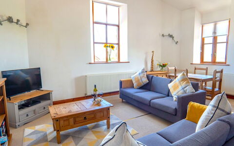 Fields Barn at Widemouth Bay: Furniture, Interior Design, Flooring, Wall, Floor, Wood, Ceiling, Couch, Room, Living Room
