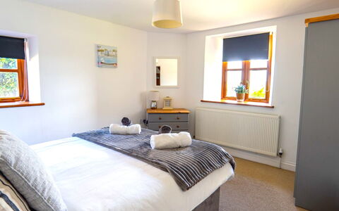 Fields Barn at Widemouth Bay: Furniture, Wall, Interior Design, Wood, Bed, Flooring, Bedroom, Floor, Home, Bed Sheet