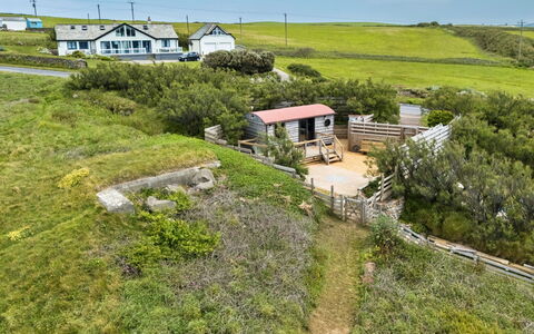 Manderley: House, Shrub, Home, Cottage, Land Lot, Rural Area, Groundcover, Estate, Slope, Porch