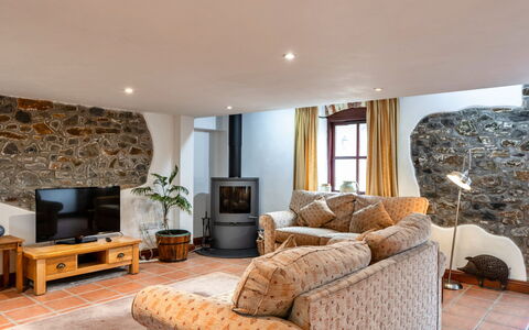 Roost, Quinceborough Farm: Furniture, Interior Design, Flooring, Floor, Wood, Ceiling, Room, Couch, Lighting, Living Room