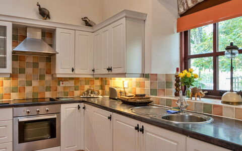 Roost, Quinceborough Farm: Kitchen, Countertop, Kitchen Appliance, Cabinetry, Interior Design, Plumbing Fixture, Flooring, Furniture, Wood, Light Fixture