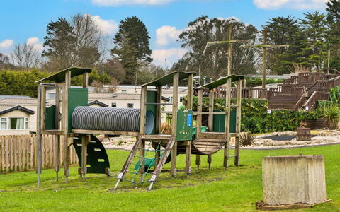 Pine Forest Lodge: Outdoor Play Equipment, Public Space, Playground Slide, Human Settlement, Playground, Park, Garden, Shade, Lawn, Yard