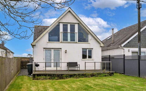 Tregirls: Sky, Cloud, House, Home, Residential Area, Roof, Cottage, Siding, Sash Window, Suburb