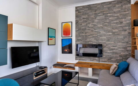 Three Gables: Furniture, Interior Design, Flooring, Wall, Couch, Television, Living Room, Floor, Wood, Ceiling