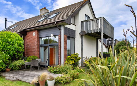 Three Gables: Building, Window, House, Roof, Home, Shrub, Cottage, Door, Residential Area