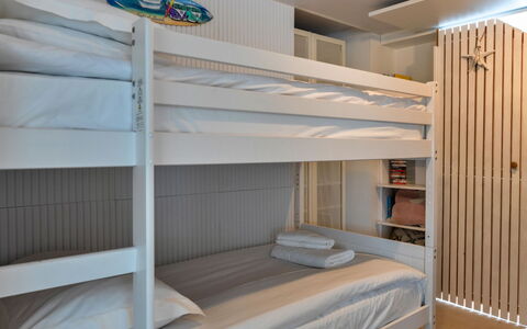 Three Gables: Bedroom, Wood, Interior Design, Bed, Bunk Bed, Ceiling, Flooring, Floor, Furniture, Bed Sheet