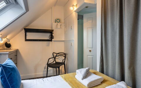 Saltwater Hideaway: Door, Bedroom, Hotel, Lamp, Bedding, Bed
