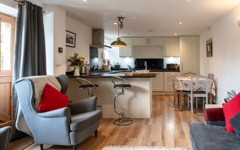 The Hayloft: Furniture, Interior Design, Flooring, Wood, Floor, Ceiling, Chair, Room, Table, Living Room