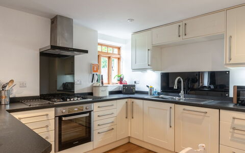 The Hayloft: Kitchen Appliance, Kitchen, Countertop, Interior Design, Major Appliance, Furniture, Cabinetry, Flooring, Home Appliance, Kitchen Stove