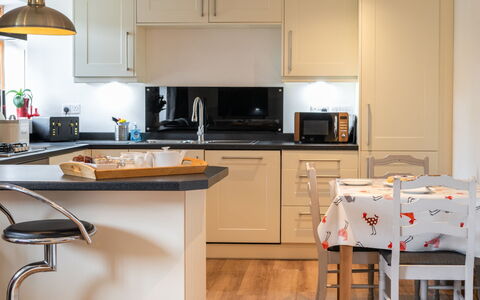 The Hayloft: Furniture, Kitchen, Kitchen Appliance, Countertop, Interior Design, Cabinetry, Major Appliance, Flooring, Wood, Home Appliance