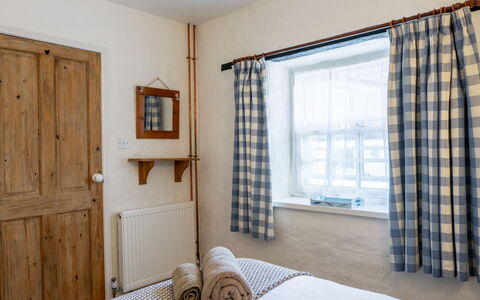Swallow Cottage: Wall, Wood, Interior Design, Furniture, Textile, Bedroom, Bed, Ceiling, Linens, Home