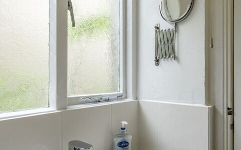 Swallow Cottage: Bathroom, Bathroom Sink, Plumbing Fixture, Interior Design, Wall, Sink, Flooring, Mirror, Tap, Floor