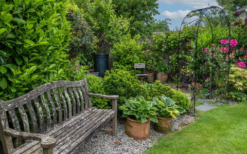 Swallow Cottage: Green, Garden, Shrub, Outdoor Bench, Plant Community, Landscape, Outdoor Furniture, Groundcover, Spring