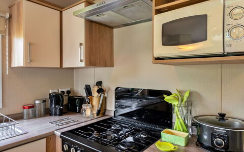 Stargazey: Kitchen, Kitchen Appliance, Countertop, Major Appliance, Kitchen Stove, Furniture, Home Appliance, Stove, Gas Stove, Cabinetry