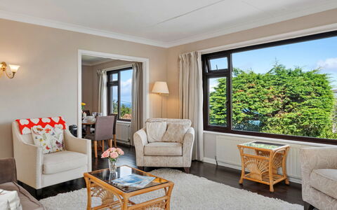 Michel: Furniture, Interior Design, Flooring, Couch, Floor, Ceiling, Wood, Room, Living Room, Table