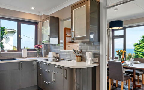 Michel: Furniture, Interior Design, Kitchen, Cabinetry, Countertop, Kitchen Appliance, Flooring, Wood, Major Appliance, Home