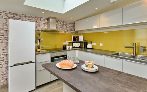 Agan Chi: Kitchen, Countertop, Interior Design, Furniture, Kitchen Appliance, Major Appliance, Flooring, Wood, Ceiling, Floor