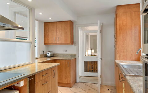 Little Watch House: Countertop, Cabinetry, Flooring, Furniture, Kitchen, Interior Design, Wood, Floor, Kitchen Appliance, Room