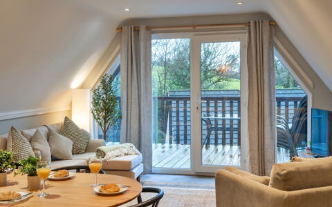 Toblerone Lodge: Furniture, Interior Design, Wood, Ceiling, Flooring, Couch, Home, Floor, Lighting, Living Room