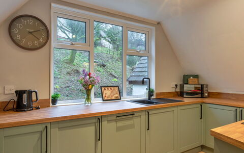 Toblerone Lodge: Interior Design, Wood, Flooring, Kitchen, Kitchen Appliance, Countertop, Furniture, Cabinetry, Lighting, Floor