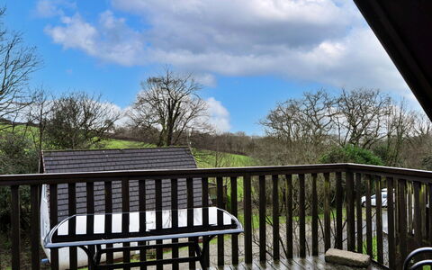 Toblerone Lodge: Wood, Furniture, Porch, Baluster, Handrail, Outdoor Furniture, Deck, Hardwood, Balcony, Fence