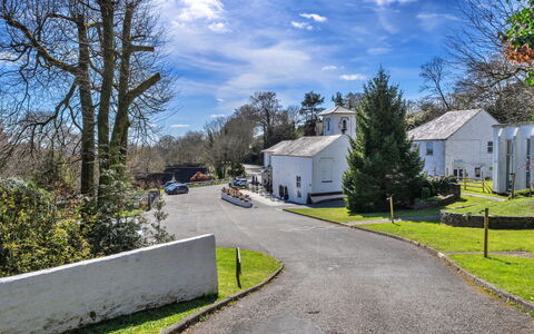 Toblerone Lodge: Tree, Branch, Road Surface, House, Asphalt, Landscape, Home, Human Settlement, Cottage