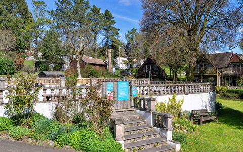 Toblerone Lodge: Tree, Shrub, Home, Spring, Fence, Garden, Cottage, Landscaping, Shade