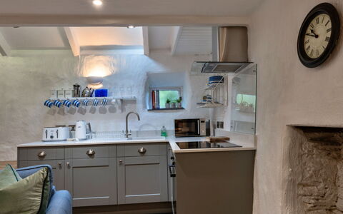 Spray Barn: Kitchen Appliance, Kitchen, Countertop, Major Appliance, Furniture, Interior Design, Cabinetry, Flooring, Home Appliance, Plumbing Fixture