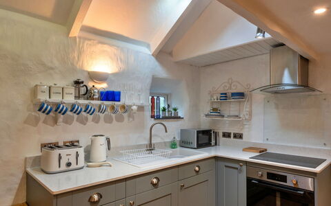 Spray Barn: Kitchen, Kitchen Appliance, Countertop, Major Appliance, Interior Design, Cabinetry, Ceiling, Kitchen Stove, Home Appliance, Flooring