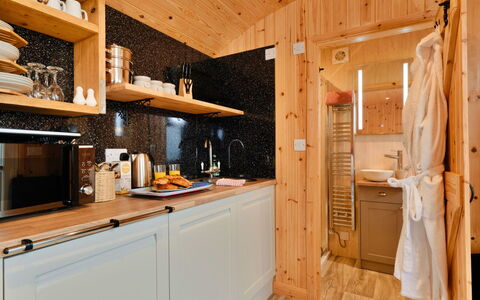 Demelza Shepherd'S Hut: Wood, Flooring, Kitchen, Interior Design, Cabinetry, Countertop, Furniture, Plumbing Fixture, Floor, Lighting