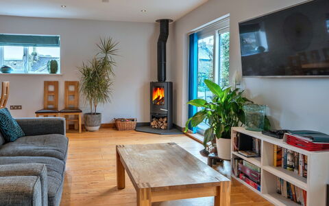 Lake View: Furniture, Interior Design, Wood, Flooring, Hearth, Living Room, Floor, Lighting, Table, Home