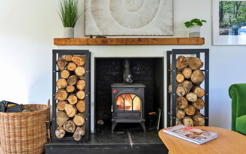Thyme Bank: Furniture, Hearth, Flooring, Interior Design, Wood-Burning Stove, Fireplace, Room, Heat, Picture Frame, Living Room