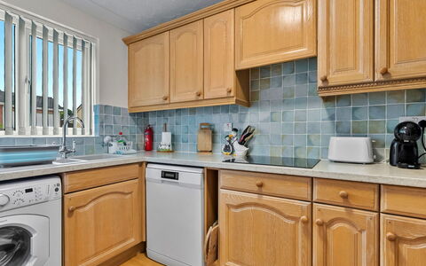 Lavender Waye: Kitchen, Countertop, Major Appliance, Kitchen Appliance, Flooring, Cabinetry, Interior Design, Floor, Kitchen Sink, Sink