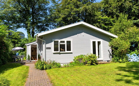 Brockwood: Grass, House, Shrub, Cottage, Home, Groundcover, Garden, Siding, Lawn