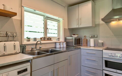 Brockwood: Kitchen Appliance, Kitchen, Countertop, Cabinetry, Major Appliance, Home Appliance, Interior Design, Kitchen Stove, Kitchen Sink, Stove