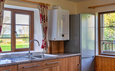 Tarka'S Holt Log Cabin, Stowford: Kitchen, Kitchen Appliance, Wood, Flooring, Interior Design, Cabinetry, Countertop, Furniture, Floor, Kitchen Sink