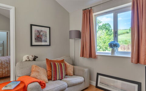 Marsh Cottage: Furniture, Interior Design, Couch, Flooring, Wood, Floor, Room, Ceiling, Living Room, Lighting