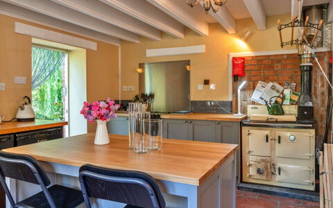 Marsh Cottage: Kitchen, Countertop, Kitchen Appliance, Furniture, Interior Design, Cabinetry, Major Appliance, Wood, Flooring, Home Appliance