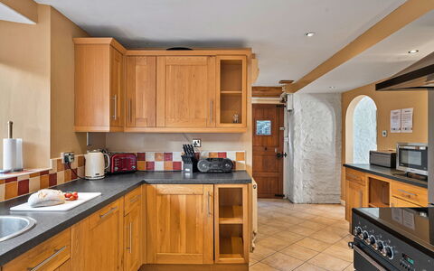 The Old School House at Instow: Kitchen, Countertop, Cabinetry, Interior Design, Furniture, Flooring, Wood, Kitchen Appliance, Major Appliance, Floor