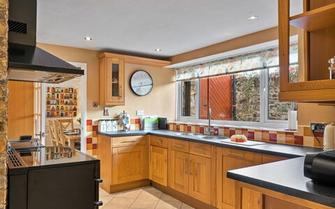 The Old School House at Instow: Kitchen, Furniture, Countertop, Cabinetry, Kitchen Appliance, Interior Design, Major Appliance, Flooring, Wood, Home Appliance