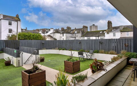 Plymouth City Apartment 15: Garden, Backyard, Courtyard, Landscaping, Yard, Flowerpot, Concrete, Artificial Turf, Houseplant, Lawn