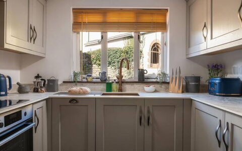 Coulscott Peacock Cottage: Kitchen, Countertop, Kitchen Appliance, Interior Design, Cabinetry, Furniture, Major Appliance, Ceiling, Home, Flooring