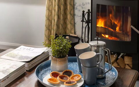 Coulscott Aylesbury Cottage: Furniture, Tableware, Interior Design, Flooring, Table, Serveware, Room, Hearth, Living Room, Chair