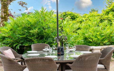 Coulscott Georgian House: Furniture, Outdoor Furniture, Chair, Table, Outdoor Table, Kitchen & Dining Room Table, Umbrella, Patio, Shade, Garden