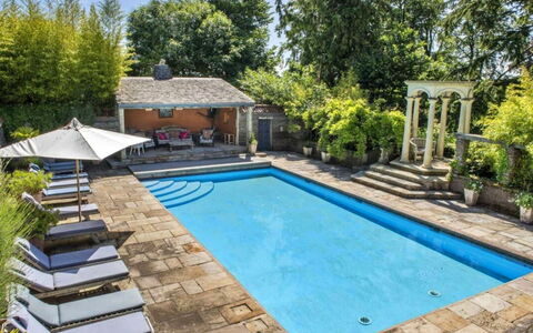 The Lost Manor: Swimming Pool, Blue, Furniture, Outdoor Furniture, Leisure, Water Feature, Resort, Chair, Composite Material, Flagstone