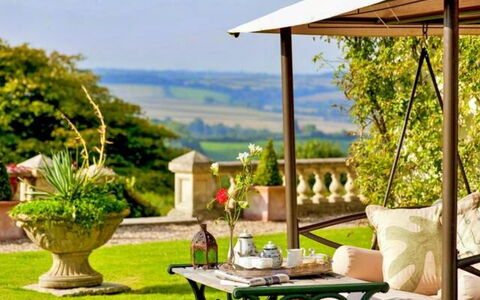 The Lost Manor: Furniture, Chair, Outdoor Furniture, Table, Shade, Garden, Outdoor Table, Patio, Lawn, Outdoor Structure
