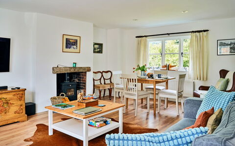 Coachmans Cottage: Furniture, Interior Design, Flooring, Couch, Floor, Room, Table, Wood, Ceiling, Living Room